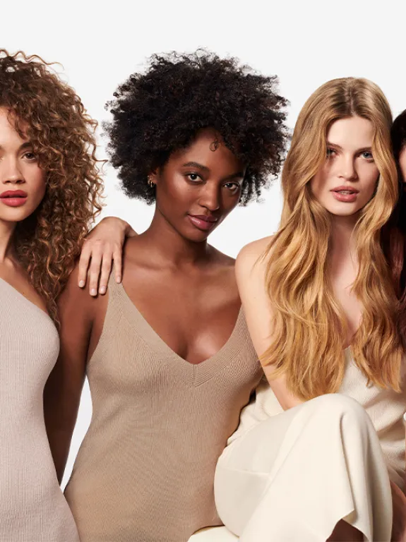 Four models on a gray background