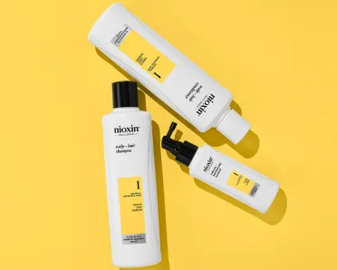 System Kit #1 by Nioxin on a yellow background