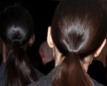 Victoria Beckham's Paris Fashion Week Show photoshoot – three women with their hair in ponytails