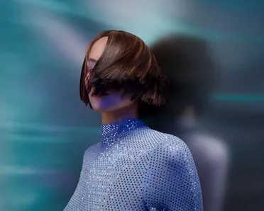 A model with dark, short hair that partially obscures her face, set against a surreal backdrop of vibrant, swirling colors that create an otherworldly atmosphere.